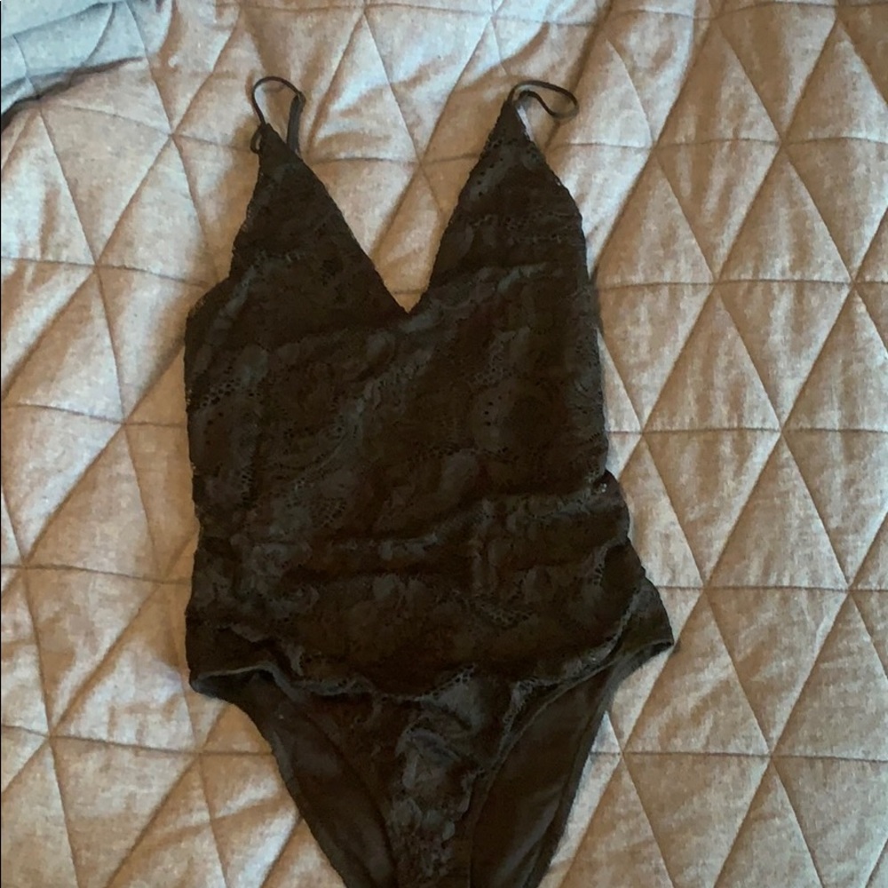 Deep v. Lace black body suit.